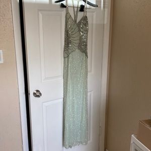 Beautiful beaded gown. Silk. Black tie brand.